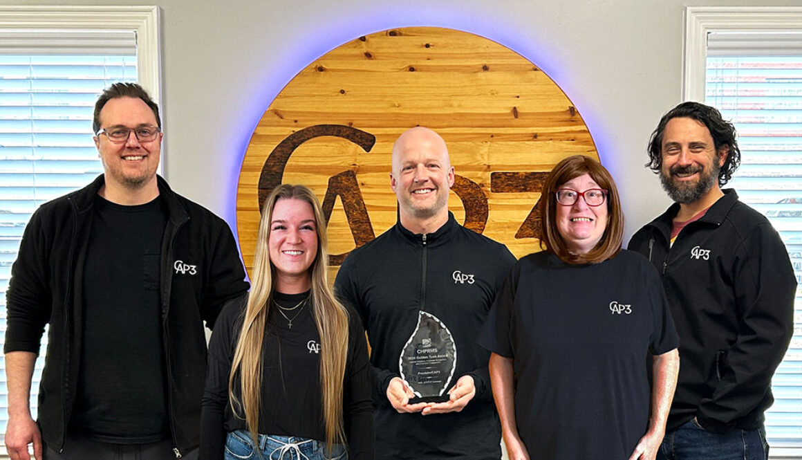 Members of the CAP3:Proclaim team celebrate their recent Golden Tusk Award. From left, Web Director Mitch Thompson, Digital Marketing Specialist Meredith Fricke, CEO Adam Tartt, Writer Dawn Wilson and Chief Marketing Officer Matthew Coleman.